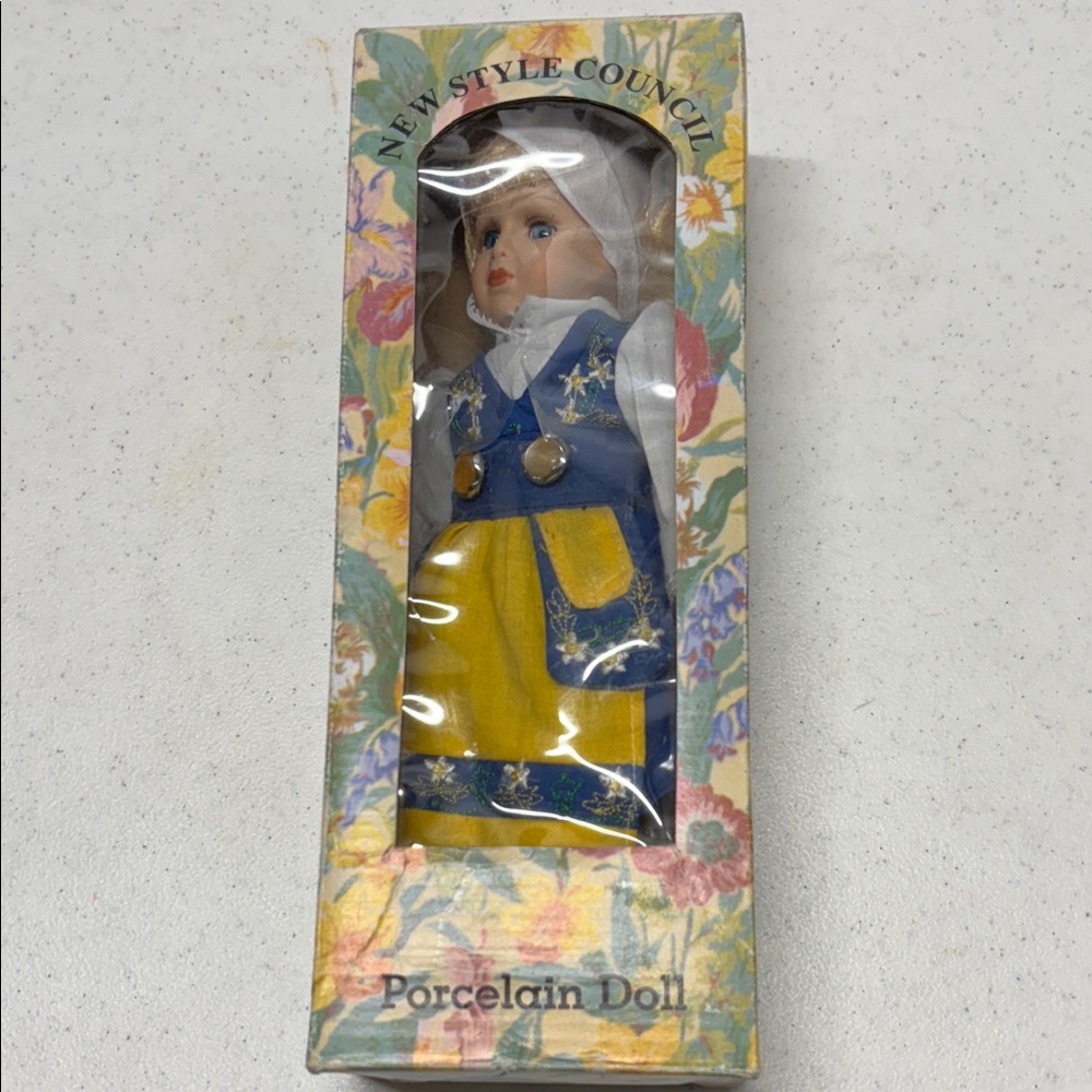 New Style Council Porcelain Doll in Blue and Yellow Outfit